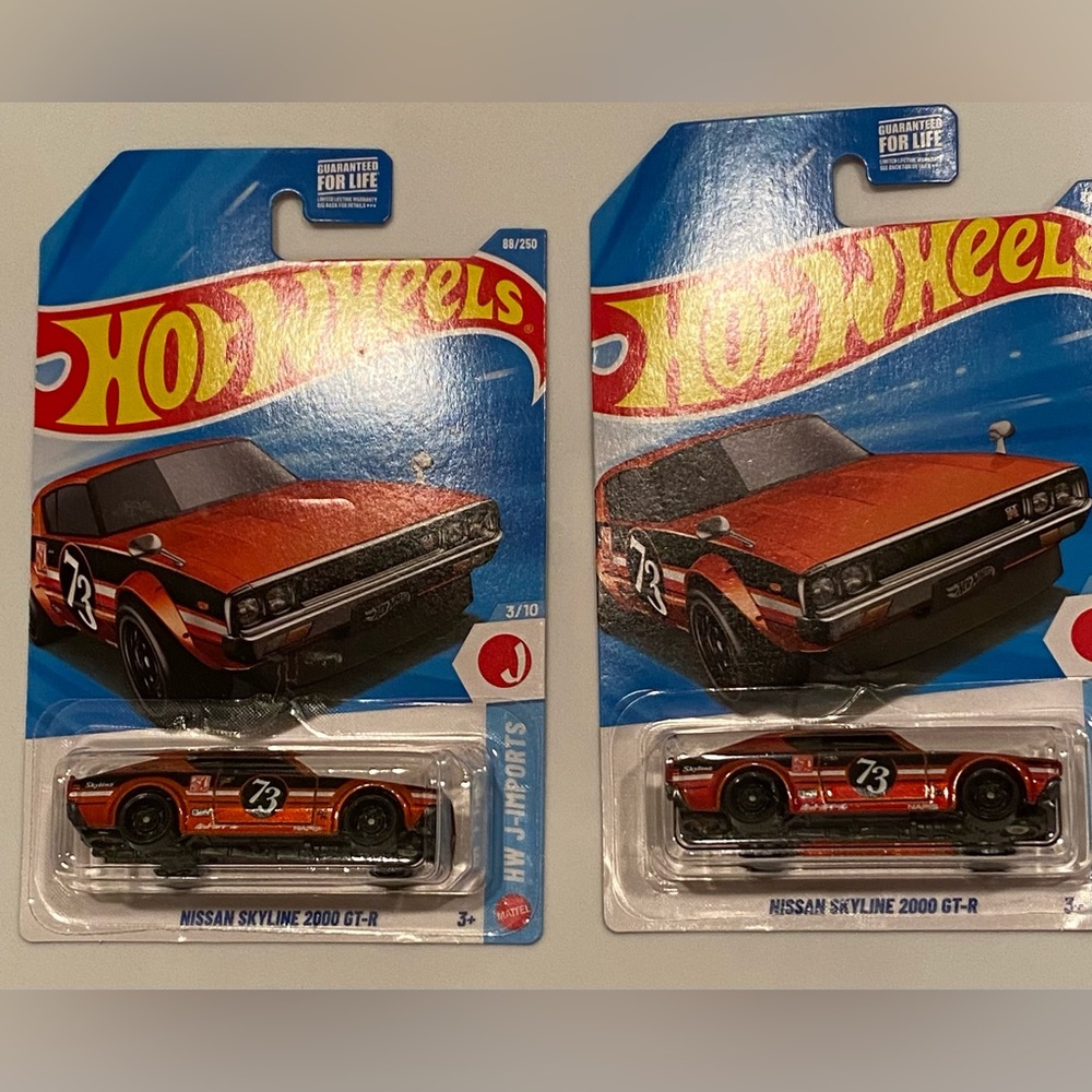 Mattel Hot Wheels Orange Nissan Skyline 2000 GT-R lot